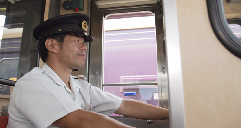 Picture of Mr. Koichi Sasaki is operating a train